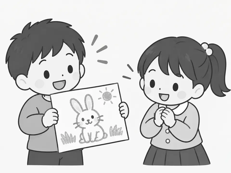 左の男の子が、ウサギを描いた絵を持って見せています。右の女の子は絵を見て笑顔で声をかけています。
