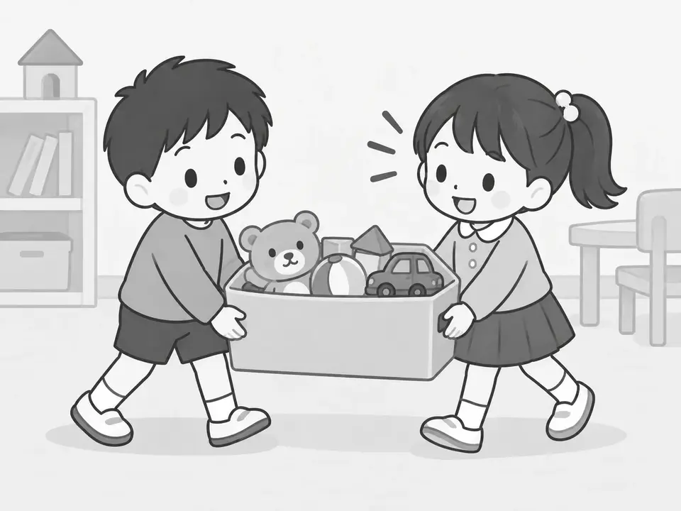 男の子と女の子が、おもちゃの入った箱を左右から持っています。右の女の子が男の子に声をかけています。